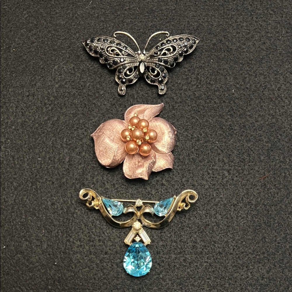 Three brooch bundle